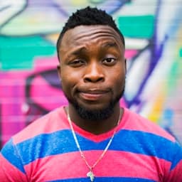 Nigerian student wearing Africa pendant